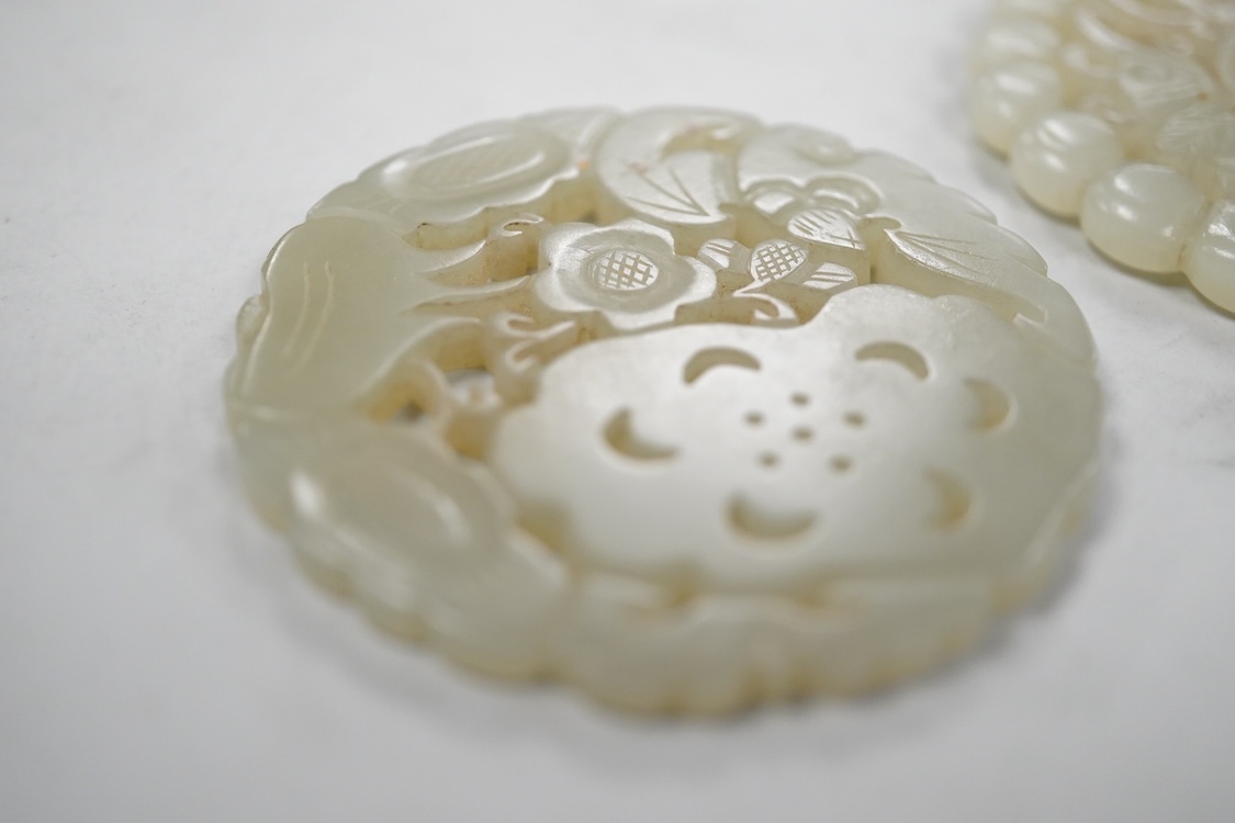 Two Chinese celadon jade circular plaques, 19th century, 5.5cm diameter